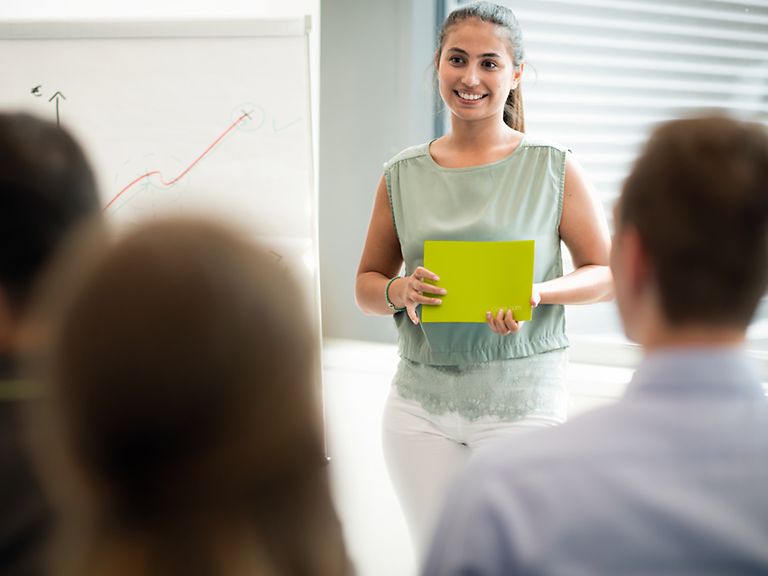 working-areas-image-finance Young woman giving a presentation